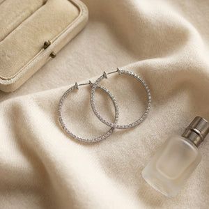 Diamond Hoop Earrings in 18K White Gold - flat lay