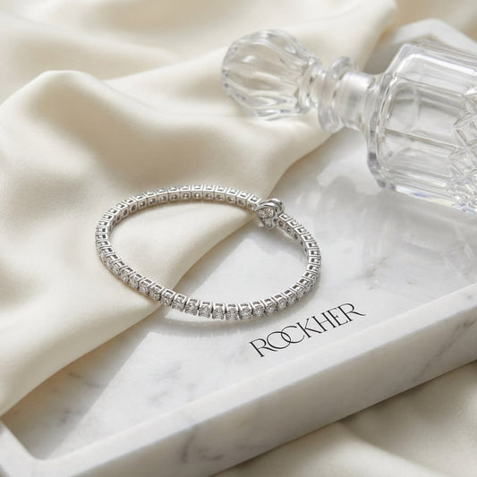 Diamond Open Cuff Bangle With Solid Heart Ends in 18K White Gold, on marble vanity tray with silk