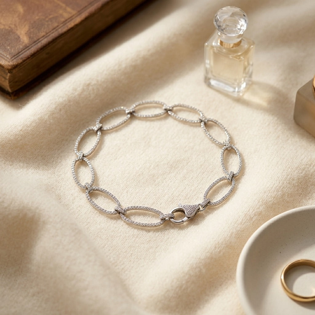 Diamond Pave Open Oval Link Bracelet in 18K White Gold - flat lay