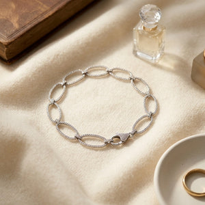 Diamond Pave Open Oval Link Bracelet in 18K White Gold - flat lay