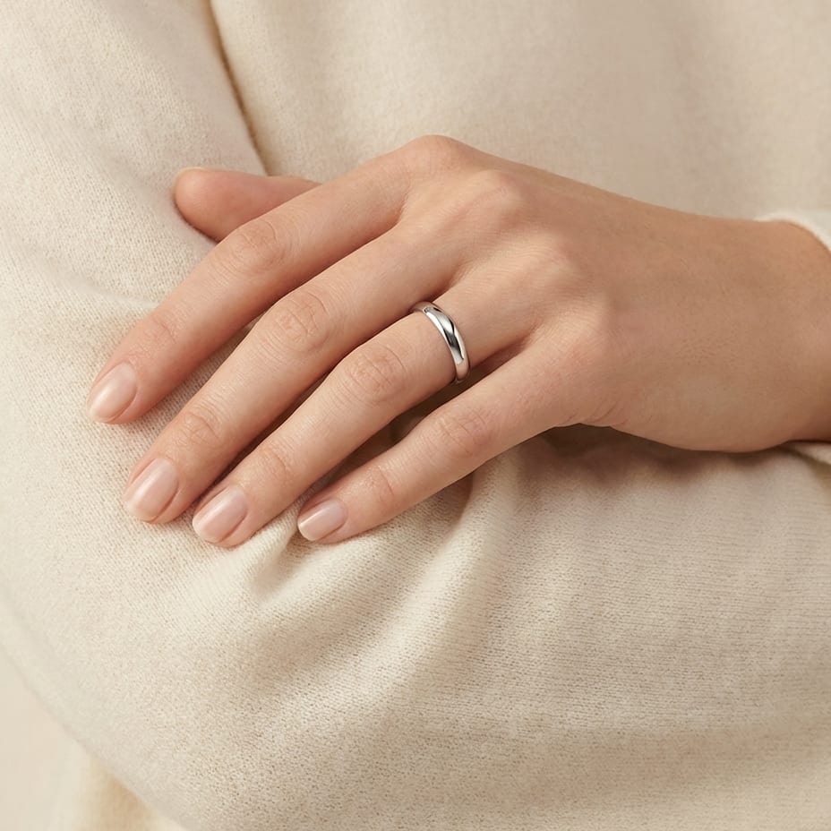 3mm Slightly Domed Traditional Oval Wedding Band in 18K White Gold, worn on hand, full view