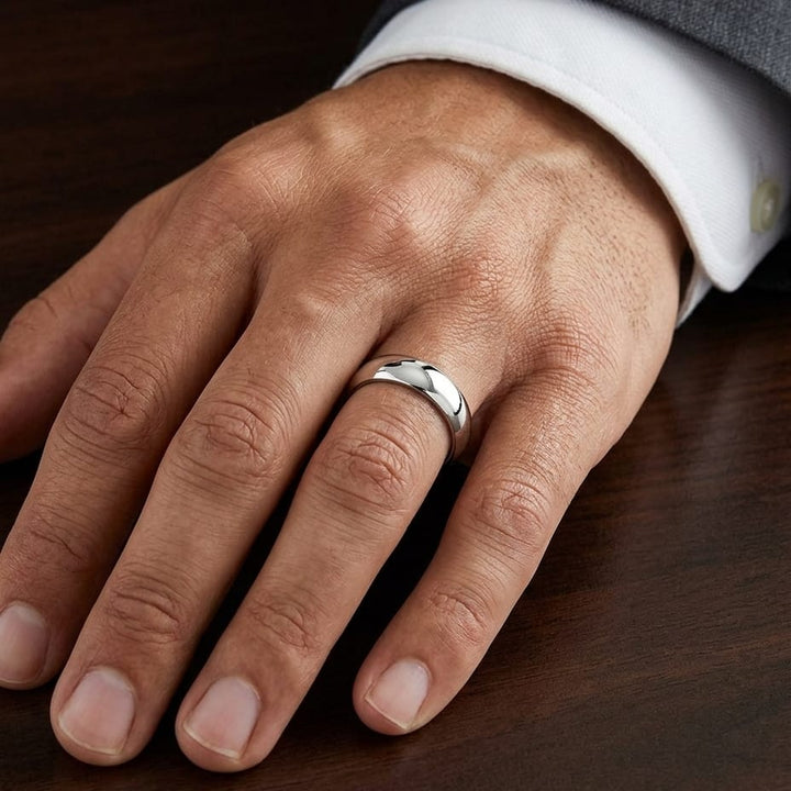 5mm Slightly Domed Traditional Oval Wedding Band in 18K White Gold, worn on hand, masculine close-up