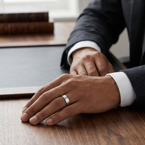 6mm Flat Comfort-Fit Wedding Band in 18K White Gold, worn on hand, masculine full view
