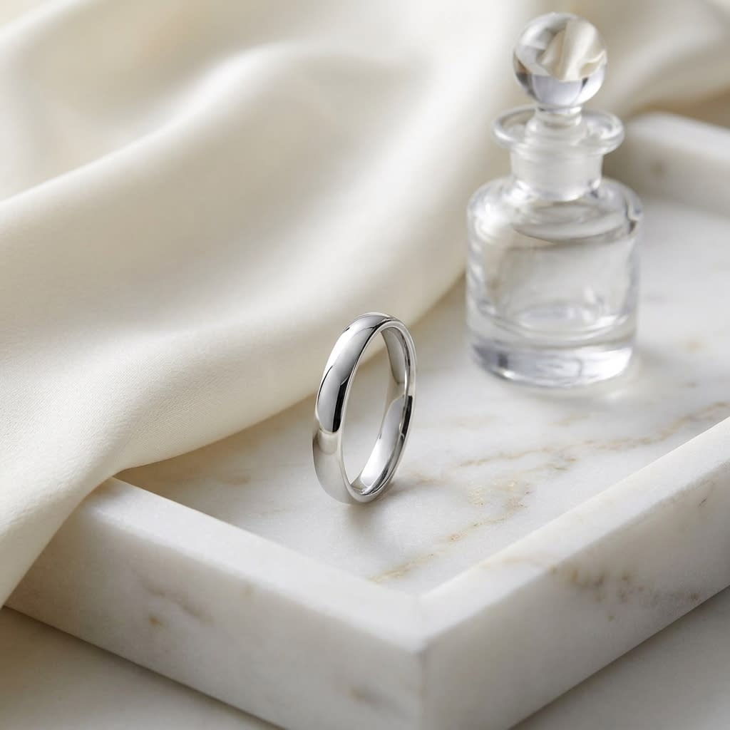 3.5mm Flat Comfort-Fit Wedding Band in 18K White Gold, on marble vanity tray with silk