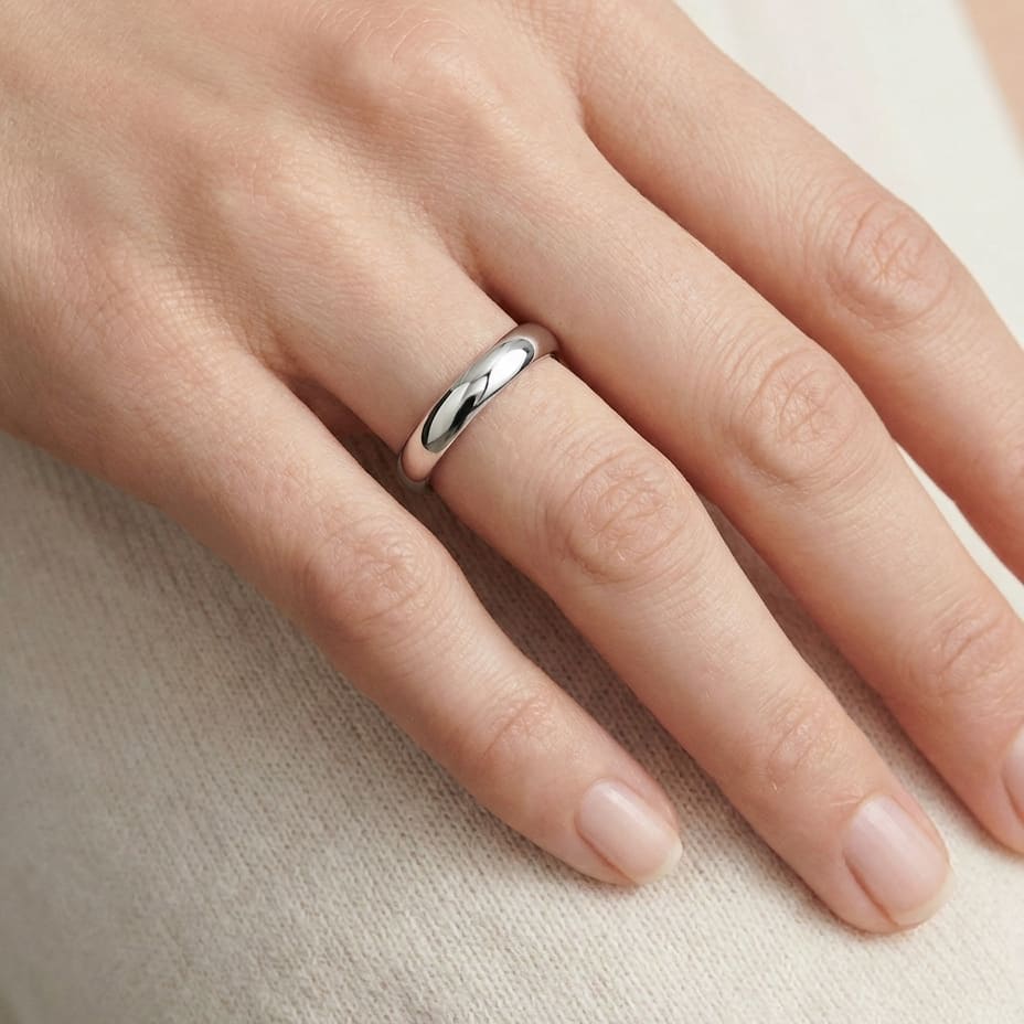 3mm High Dome Comfort-Fit Wedding Band in 18K White Gold, worn on hand, close-up