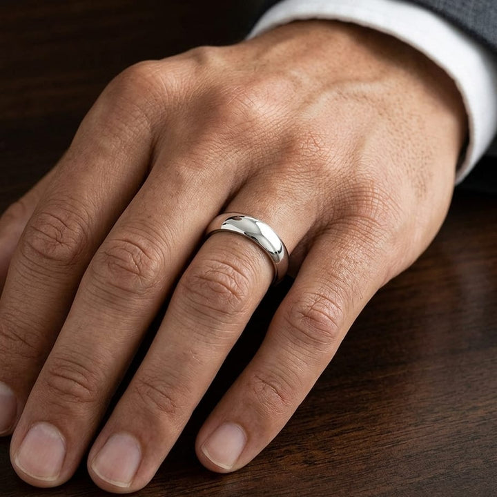 5mm High Dome Comfort-Fit Wedding Band in 18K White Gold, worn on hand, masculine close-up