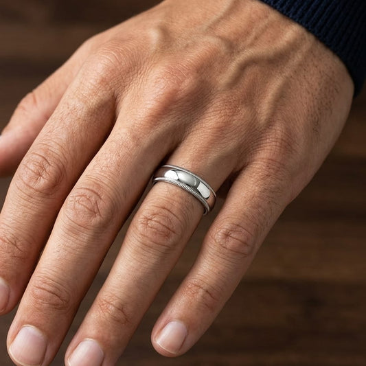 5mm Slightly Domed Milgrain Comfort-Fit Wedding Band in 18K White Gold, worn on hand, masculine close-up
