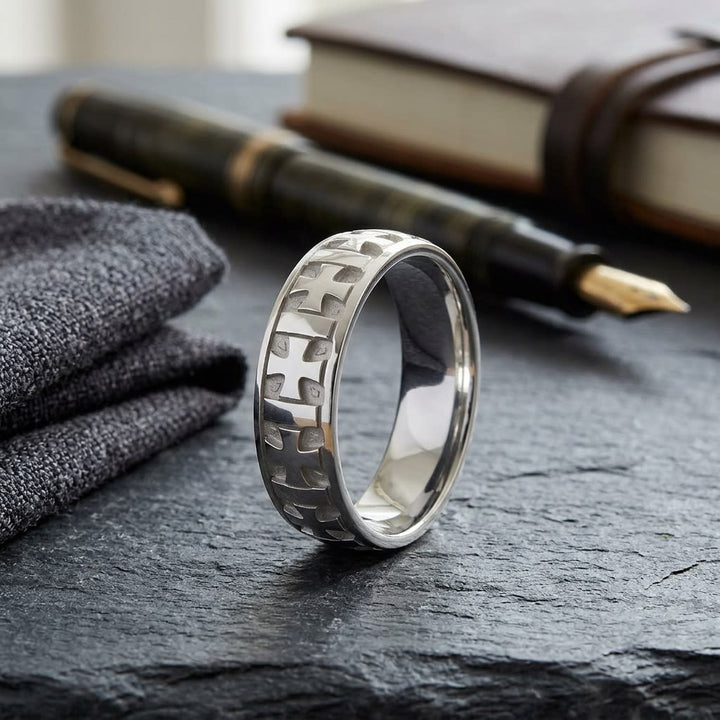 6mm Comfort-Fit Wedding Band in 18K White Gold, on walnut surface with pocket square