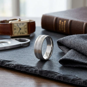 7mm Satin Finish Parallel Groove Carved Wedding Band in 18K White Gold, on walnut surface with pocket square