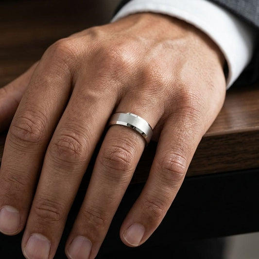 7mm Satin Finish High Polished Beveled Edge Carved Wedding Band in 18K White Gold, worn on hand, masculine close-up