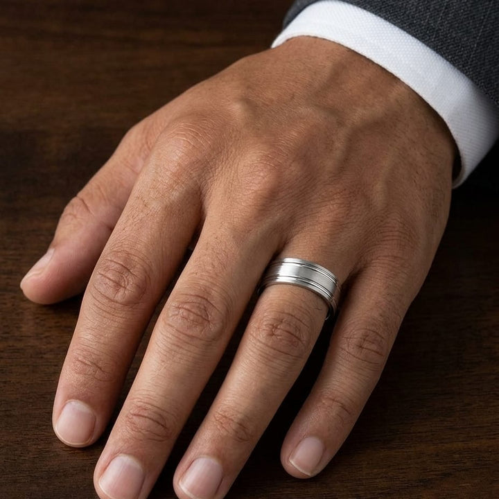 7mm Satin Finish Parallel Groove Carved Wedding Band in 18K White Gold, worn on hand, masculine close-up