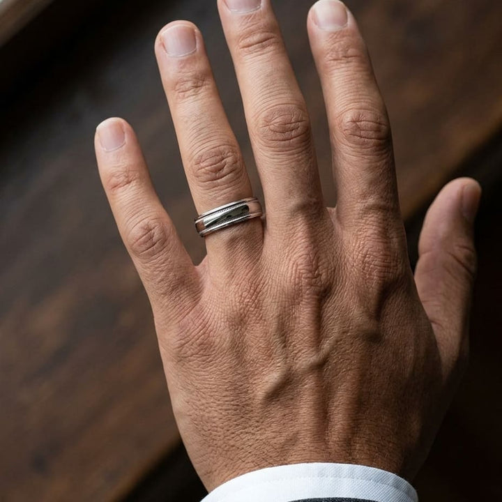6mm High Polish Milgrain Round Edge Carved Wedding Band in 18K White Gold, worn on hand, masculine close-up
