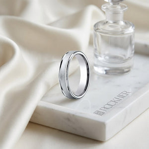 4mm Wired Finish High Polished Round Edge Carved Wedding Band in 18K White Gold, on marble vanity tray with silk
