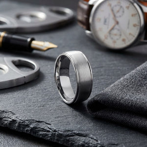 8mm Satin Finish High Polished Round Edge Carved Wedding Band in 18K White Gold, on walnut surface with pocket square