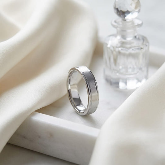 4mm Satin Finish High Polished Round Edge Carved Wedding Band in 18K White Gold, on marble vanity tray with silk