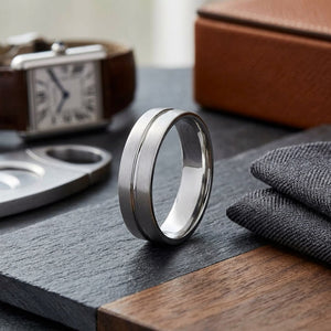6mm Satin Finish High Polished Center Cut Carved Wedding Band in 18K White Gold, on walnut surface with pocket square
