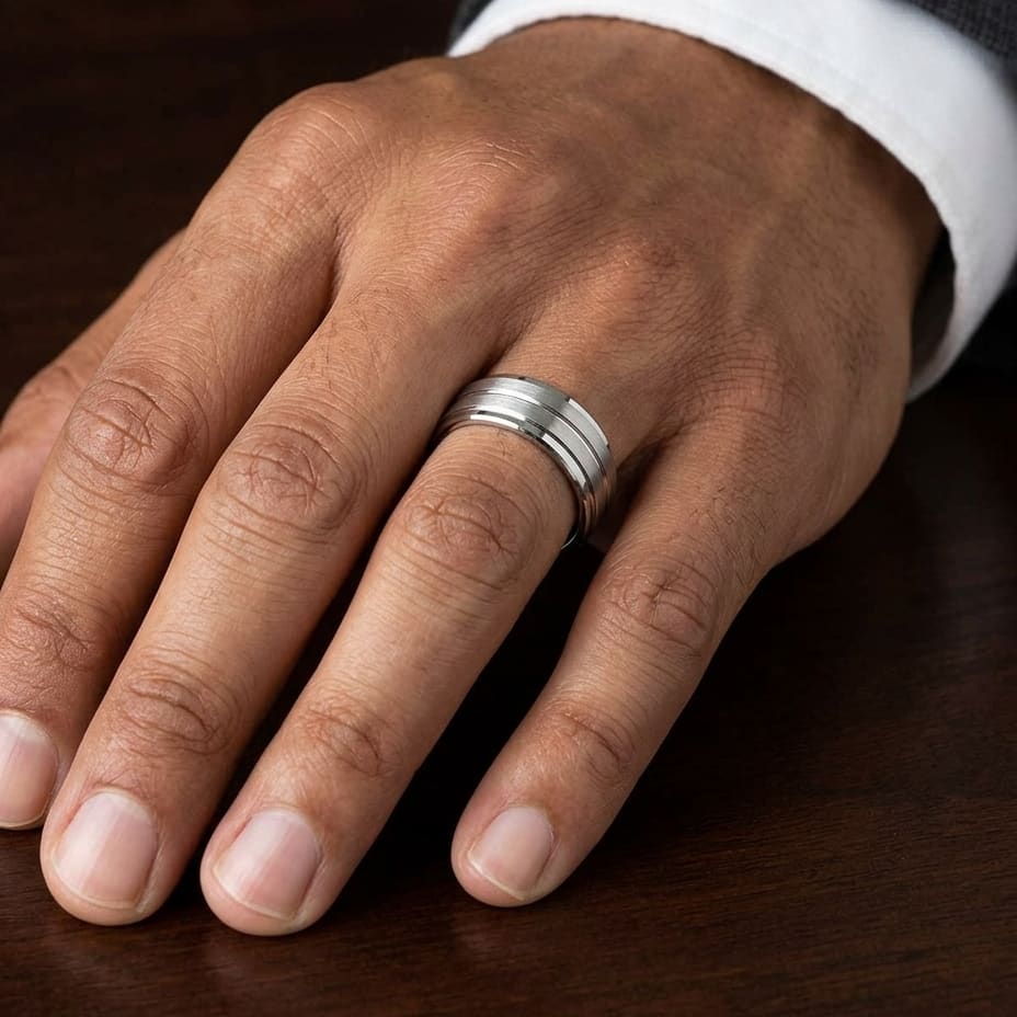 8mm Satin Finish High Polished Center Cut Carved Wedding Band in 18K White Gold, worn on hand, masculine close-up