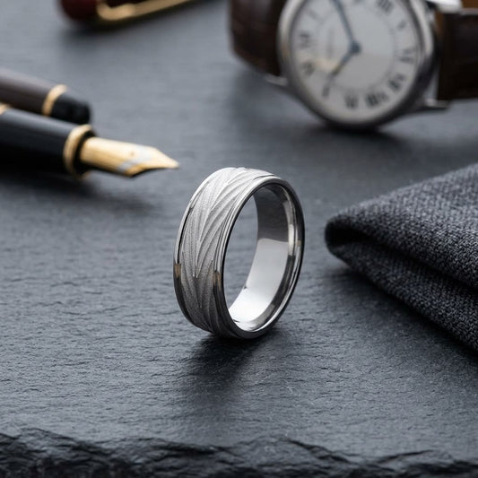 7mm Comfort-Fit Wedding Band in 18K White Gold, on walnut surface with pocket square