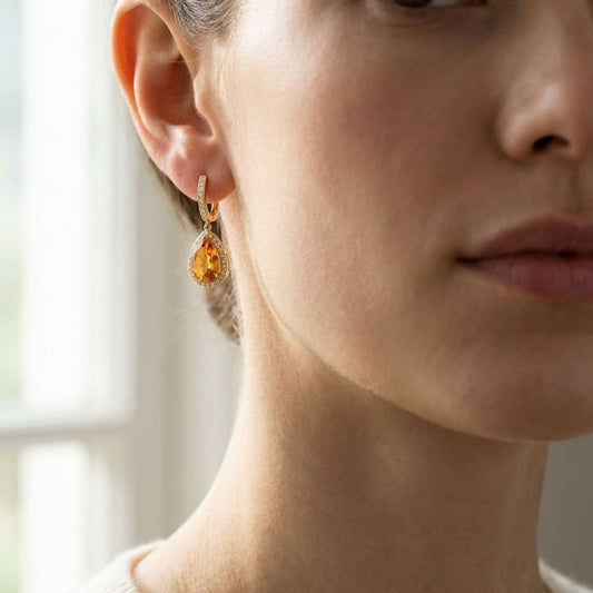 Pear Citrine and Diamond Halo Earrings in 18K Yellow Gold, 8.24ct, worn close-up portrait