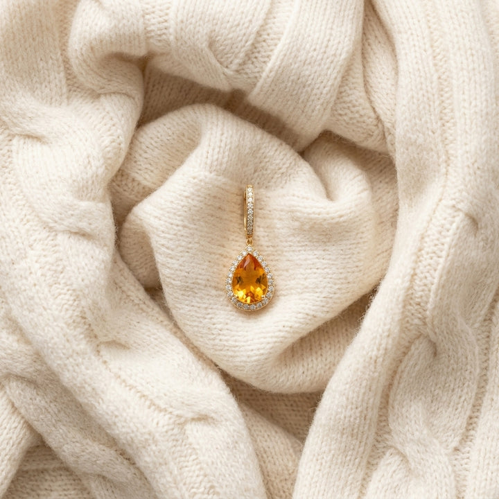 Citrine Pear & Diamond Halo Earrings in 18K Yellow Gold - flat lay