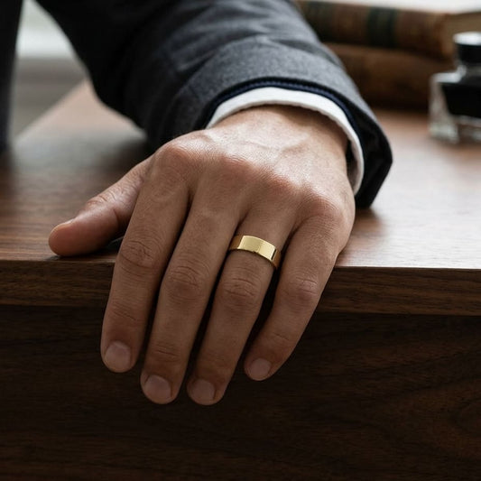 6mm Flat Comfort-Fit Wedding Band in 18K Yellow Gold, worn on hand, masculine full view
