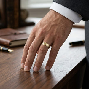 6mm Flat Milgrain Comfort-Fit Wedding Band in 18K Yellow Gold, worn on hand, masculine full view