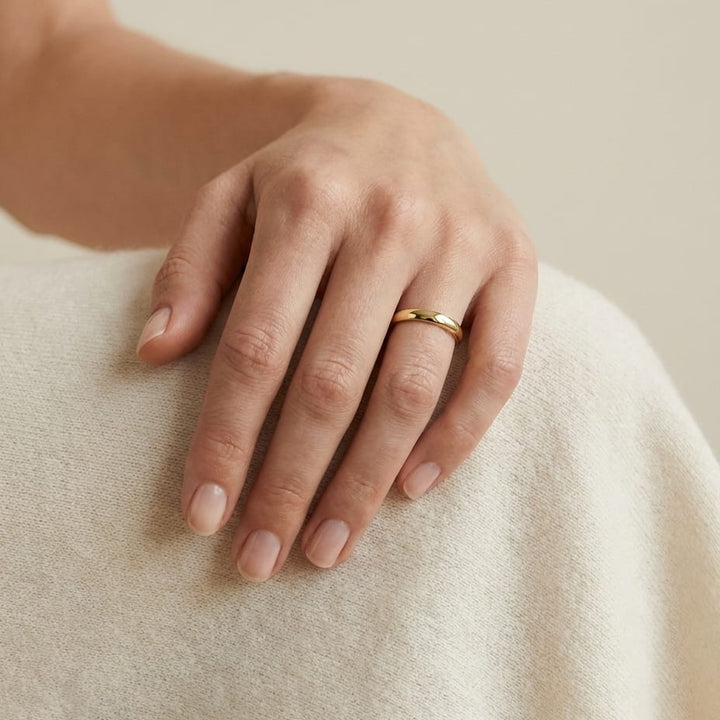 3mm High Dome Comfort-Fit Wedding Band in 18K Yellow Gold, worn on hand, full view