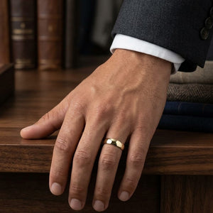 8mm Slightly Domed Comfort-Fit Wedding Band in 18K Yellow Gold, worn on hand, masculine full view