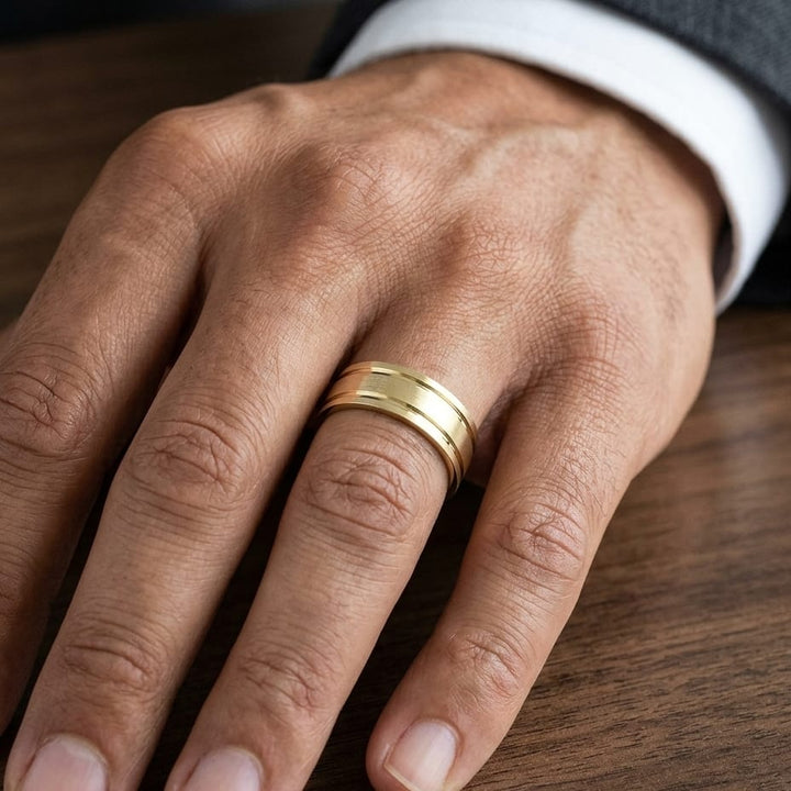 8mm Satin Finish Parallel Groove Carved Wedding Band in 18K Yellow Gold, worn on hand, masculine close-up