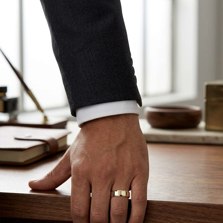 6mm High Polish Carved Wedding Band in 18K Yellow Gold, worn on hand, masculine full view
