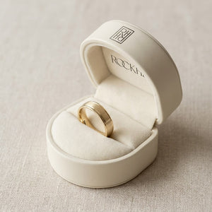 4mm Satin Finish High Polished Round Edge Carved Wedding Band in 18K Yellow Gold, in navy velvet jewelry box