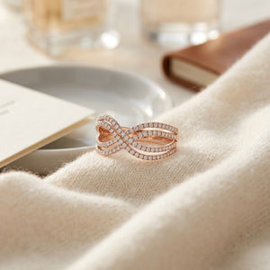Diamond Infinity Twist Ring in 14K Rose Gold - flat lay
