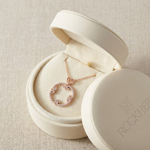 Natural Diamond Round Brilliant Pendant in 14K Rose Gold, in navy velvet jewelry box