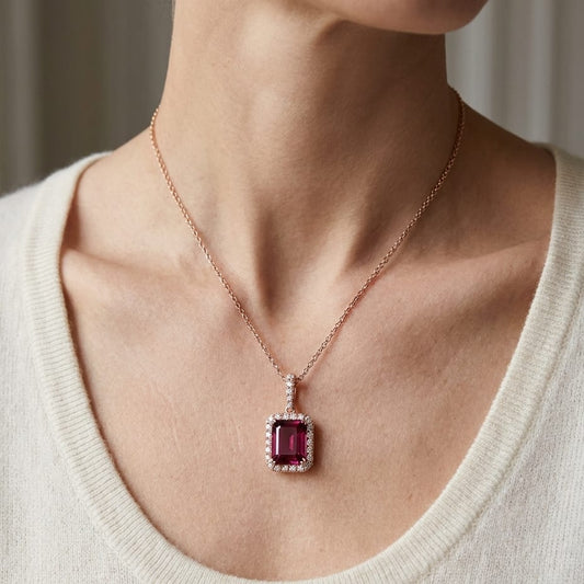 Pink Tourmaline Halo Pendant in 14K Rose Gold, worn close-up portrait