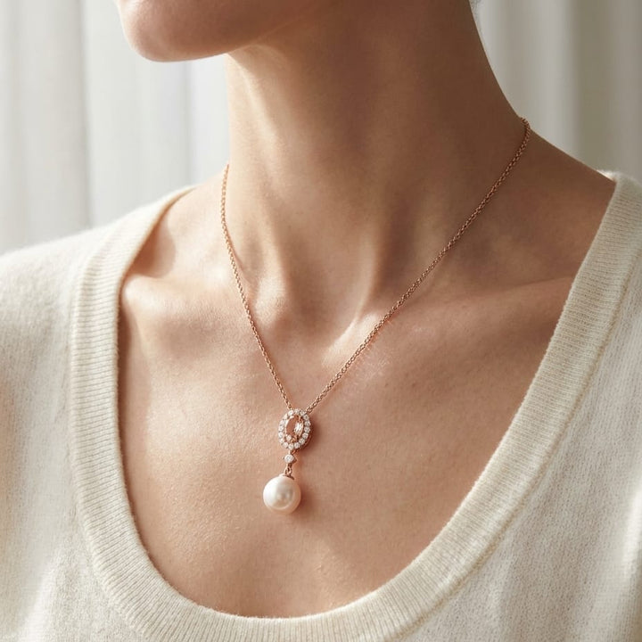 Morganite Pear Shape Pendant in 14K Rose Gold, worn close-up portrait