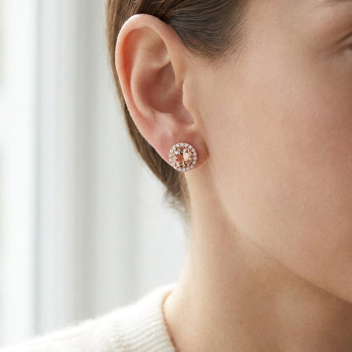 Morganite Round Brilliant Stud Earrings in 14K Rose Gold, worn close-up portrait