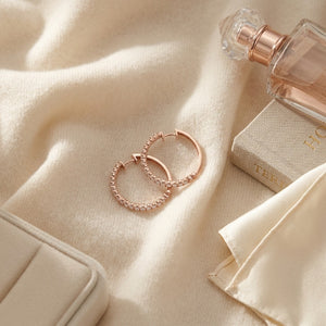 Diamond Micro Pave Hoops in 14K Rose Gold - flat lay