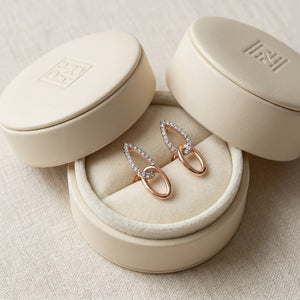 Diamond Pave And High Polish Teardrop Interlink Earrings in 14K Rose Gold, in navy velvet jewelry box