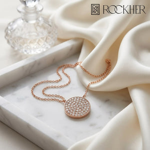 Diamond Pave Round Disk Necklace in 14K Rose Gold, on marble vanity tray with silk