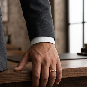 5mm Slightly Domed Traditional Oval Wedding Band in 14K Rose Gold, worn on hand, masculine full view
