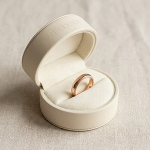 4mm Slightly Domed Traditional Oval Milgrain Wedding Band in 14K Rose Gold, in navy velvet jewelry box