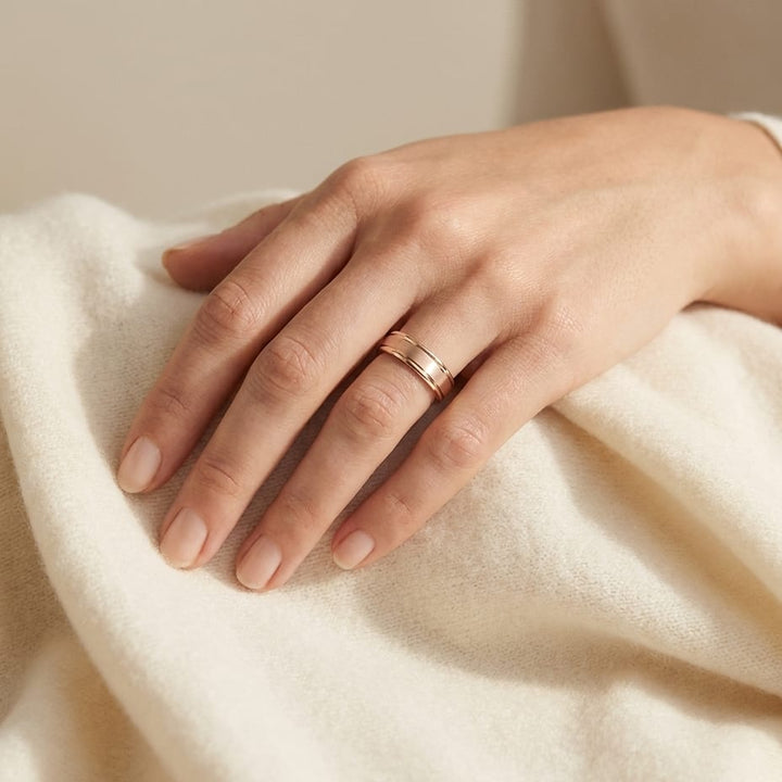 4mm Satin Finish High Polished Round Edge Carved Wedding Band in 14K Rose Gold, worn on hand, full view