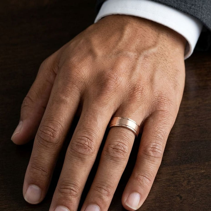 5mm Satin Finish High Polished Round Edge Carved Wedding Band in 14K Rose Gold, worn on hand, masculine close-up