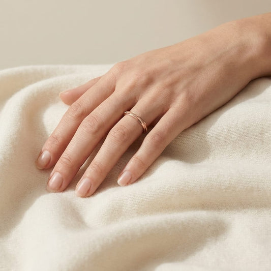 2mm High Polish Milgrain Round Edge Carved Wedding Band in 14K Rose Gold, worn on hand, full view