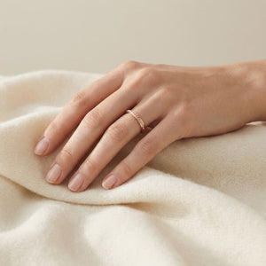 2mm High Polish Carved Wedding Band in 14K Rose Gold, worn on hand, full view