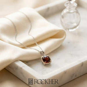 Garnet and Diamond Pendant in 14K Two-Tone Gold, 3.70ct, on marble vanity tray with silk