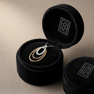 Diamond Triple Oval Pendant In 14k Two Tone Gold, in navy velvet jewelry box