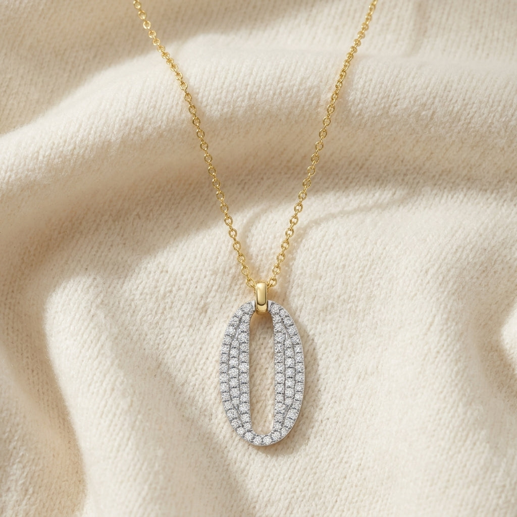 Diamond Pave Oval Pendant in 14K Two-Tone Gold - flat lay