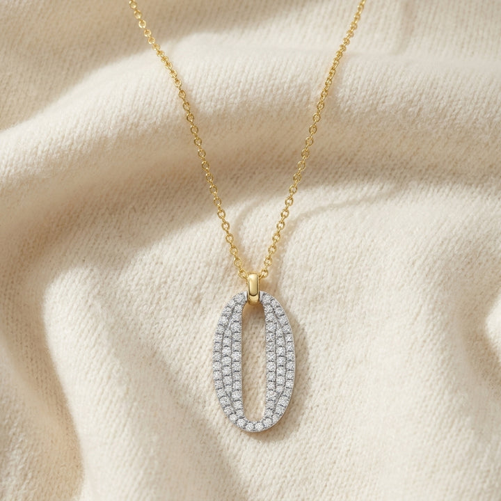Diamond Pave Oval Pendant in 14K Two-Tone Gold - flat lay