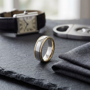 6mm High Polish Carved Wedding Band in 14K Two-Tone Gold, on walnut surface with pocket square